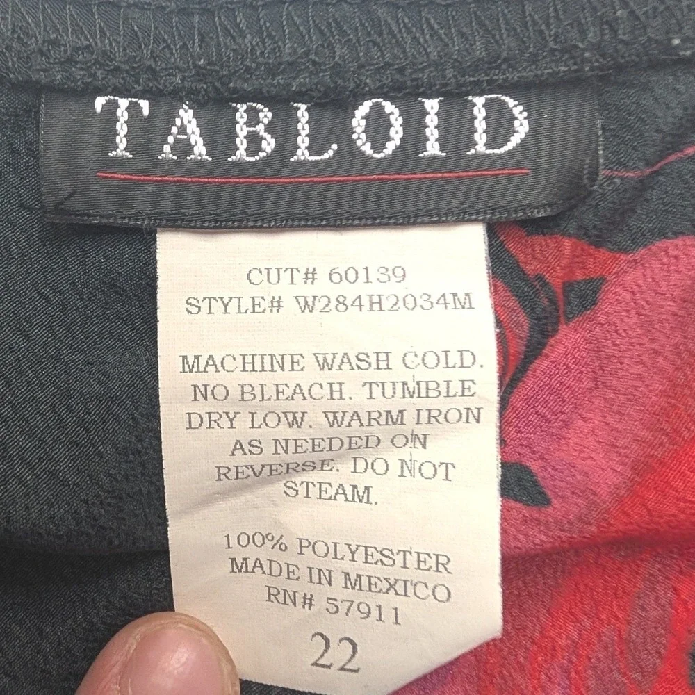 Tabloid pre owned